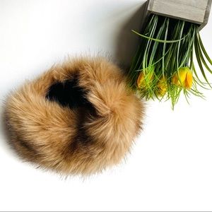 Faux fur headband hat.